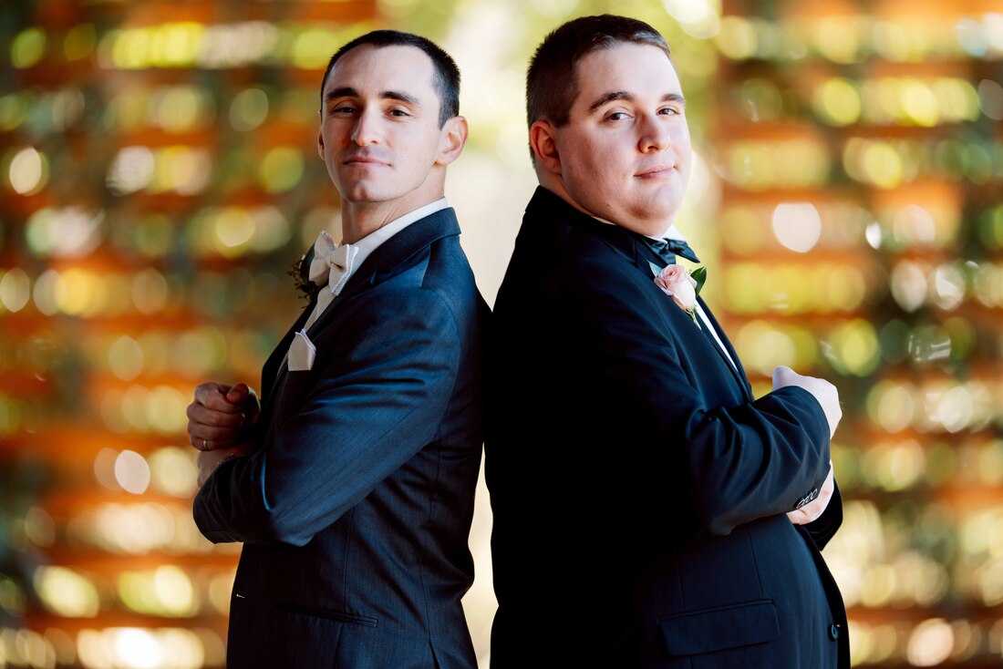 Close up portraits of groom and best man